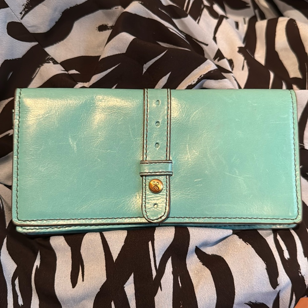 Turquoise HOBO leather wallet. Very roomy, snap close. Zipper pocket inside